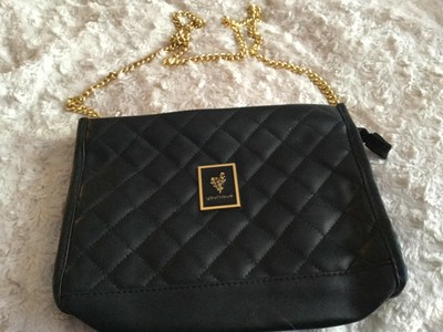 black clutch bag with gold chain