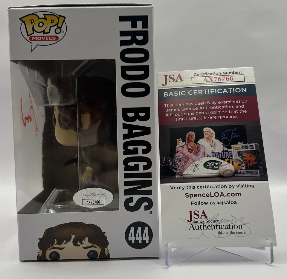ELIJAH WOOD FIRMADO 444 FRODO BOLSOS SEÑOR DE LOS ANILLOS FUNKO - CERTIFICADO DE AUTENTICIDAD JSA Foto 2 de 4