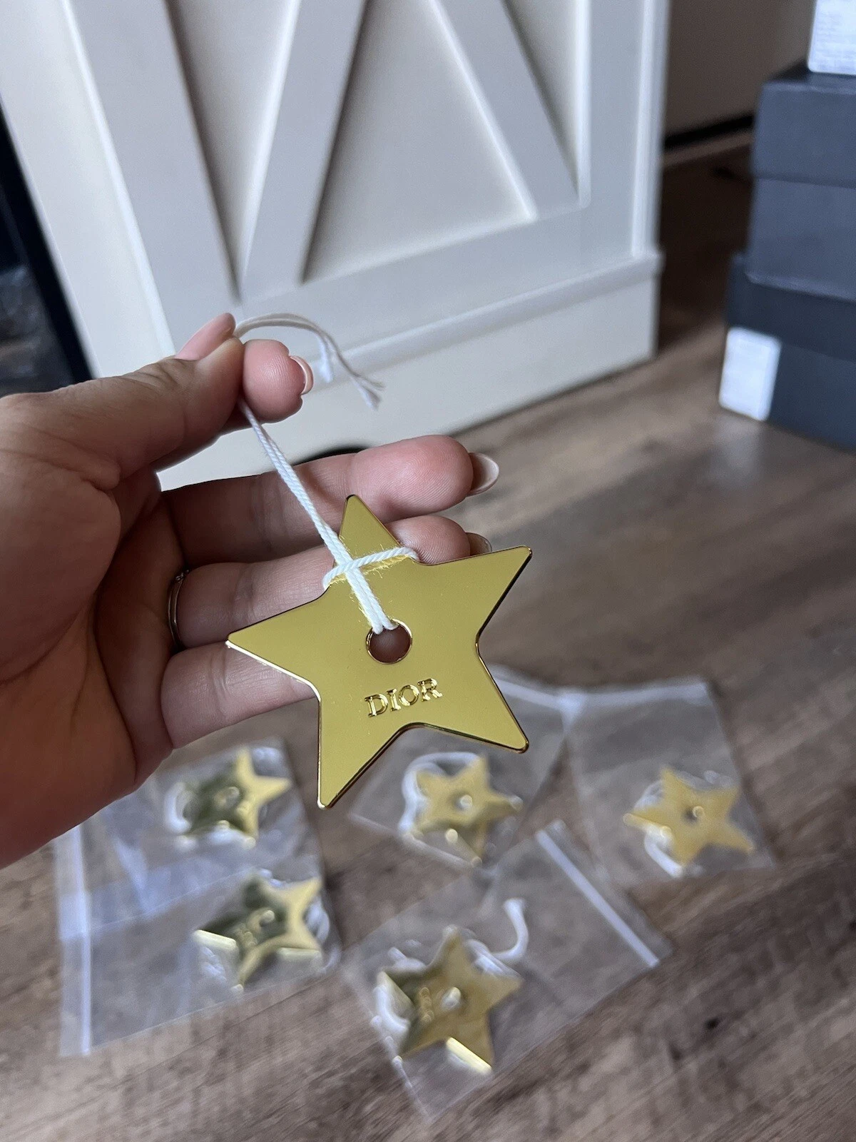Porte clés pendentif étoile métal doré Dior 100% authentique breloque   épais