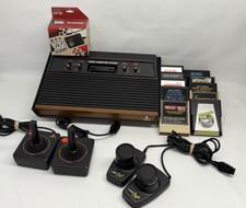 Atari 2600 Four Switch Console Bundle With Games Joysticks & Pads Cleaned Tested