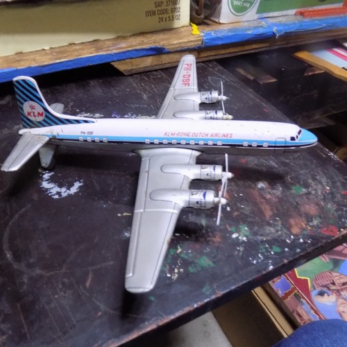 KLM Royal Dutch Airlines tin airplane and Navy fighter jet tin plane