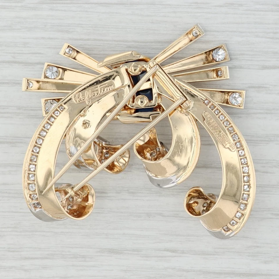 Broche clip piel reflectante Trabert Hoeffer Mouboussin zafiro diamante oro 14k Foto 2 de 4
