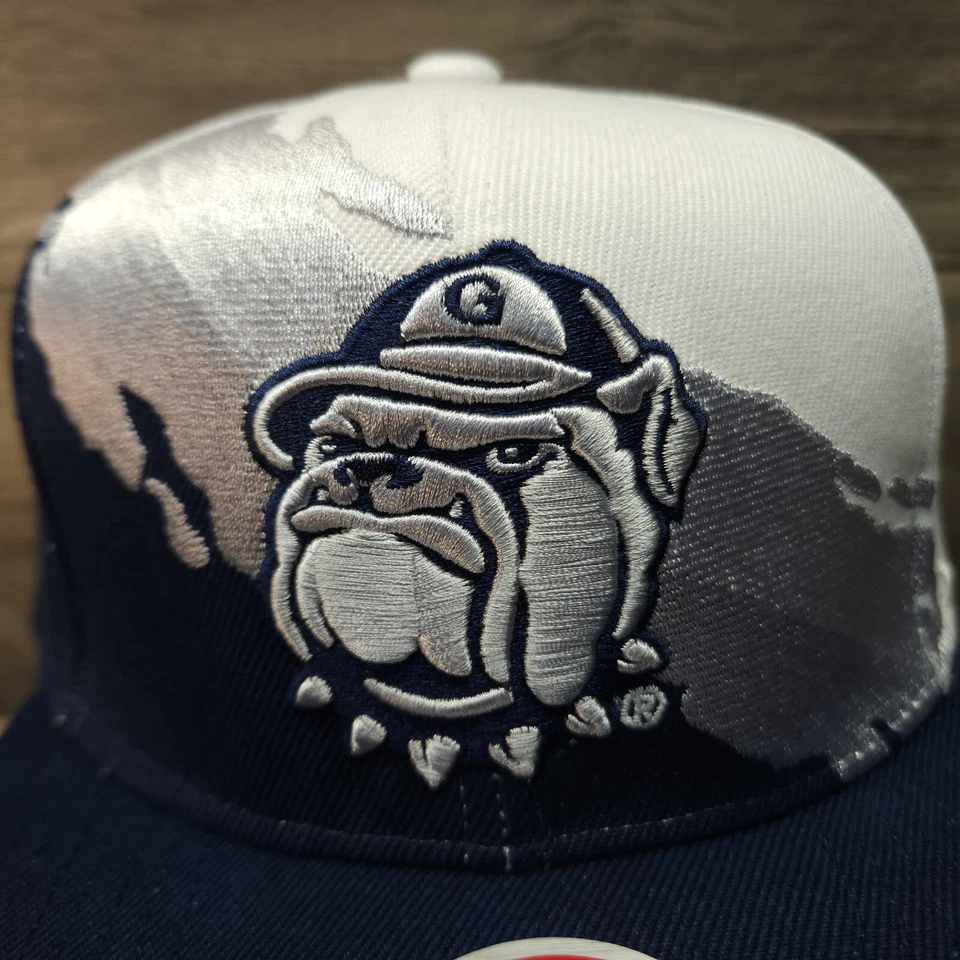 Chapéu Georgetown Hoyas Mitchell And Ness pincel respingo Snapback branco azul - Imagem 4 de 4