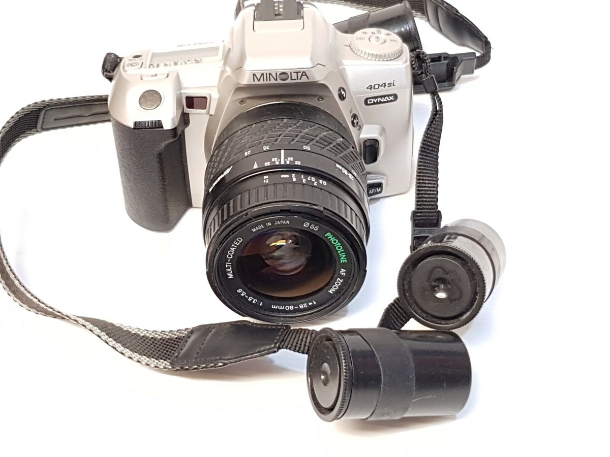 Minolta Dynax 404si argentique + objectif AF Zoom 28-80mm f/3.5-5.6 D - Gris est disponible sur la boutique