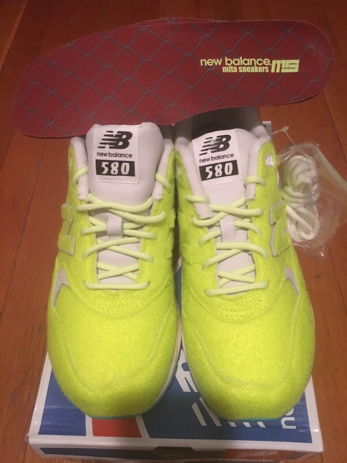 new balance 580 tennis ball