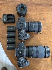 Two Sony Alpha 7 IV Mirrorless Camera Black with Lenses, Batteries, Charger