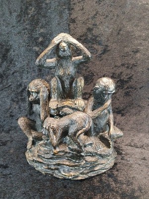 Bookend Chimps On A Rock