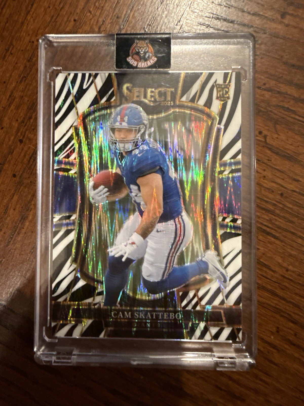 2025 Panini Select - Premier Level Cam Skattebo #195 Zebra Prizm (RC)