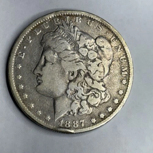 1887 O Morgan Silver Dollar Rim Bump Original Circulated