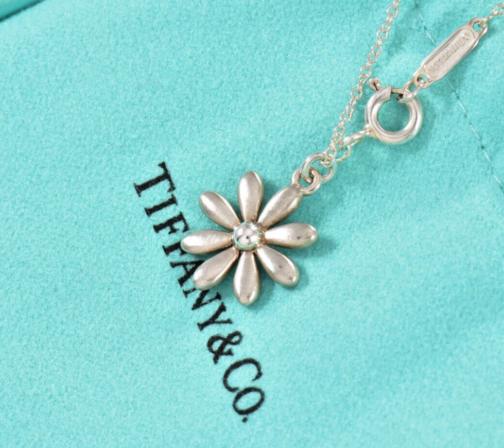Tiffany daisy necklace deals