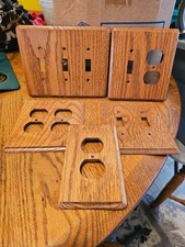 Assorted light switch/plug covers lot in woodgrain