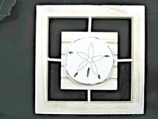 Sand Dollar distressed look wood wall plaque 8 inch