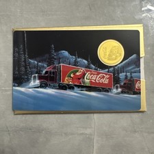1/1000 oz 999 Fine Gold Coca-Cola Santa Truck Coin Card. Limited Edition