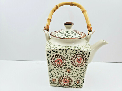 vintage teapot with spirograph pattern