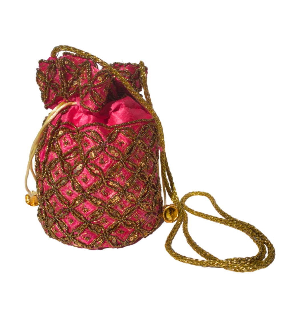 Bolso étnico, bolso bombonera, bolso fucsia dorado, bolso bandolera, bolso cubo