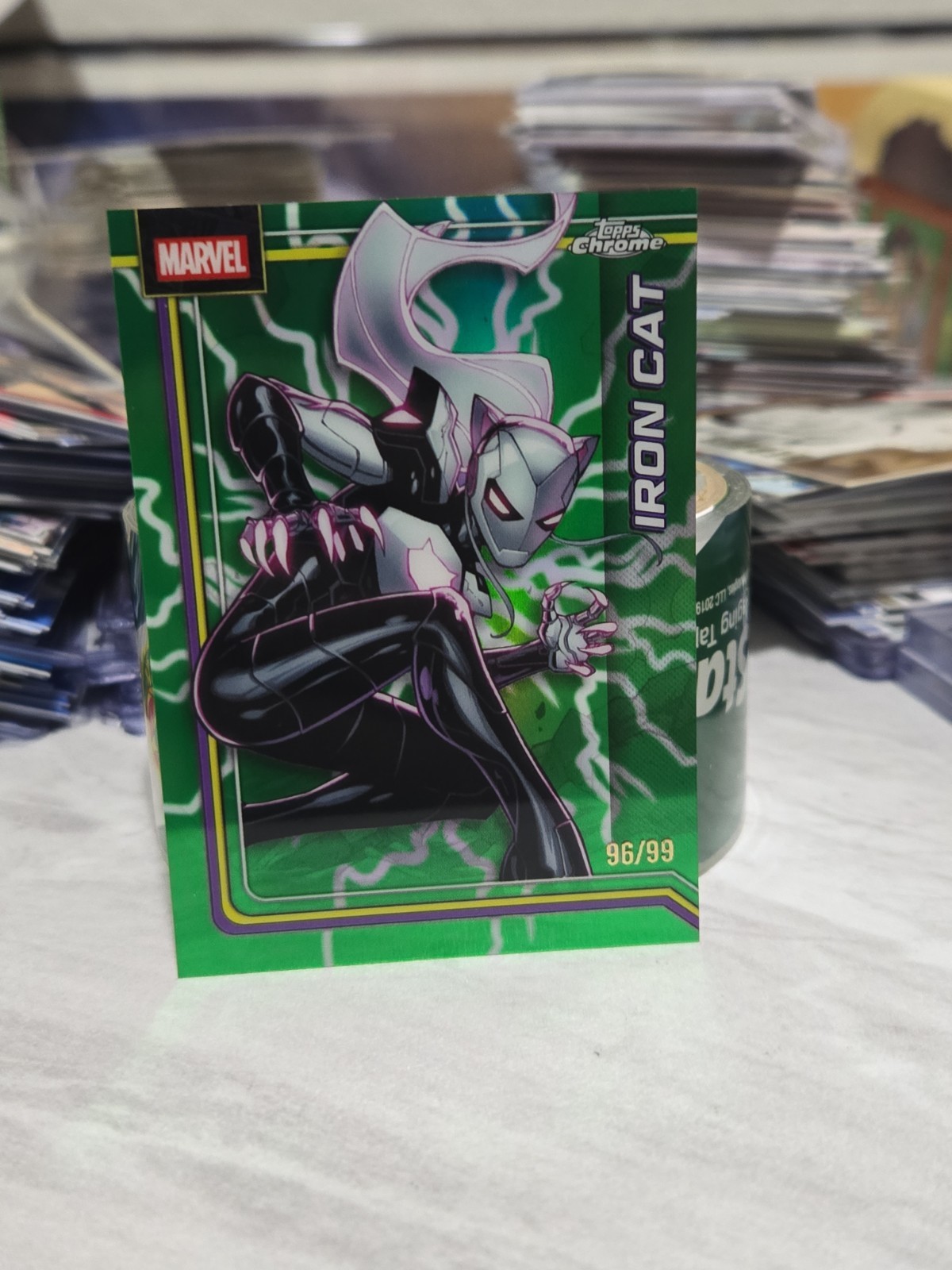 2026 Topps Chrome Marvel Comics #127 Iron Cat Green Lightning Refractor 96/99