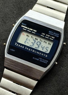 Vtg 1980 TEXAS INSTRUMENTS Men s 36mm Slim (6mm) Digital LCD Watch Steel Blue