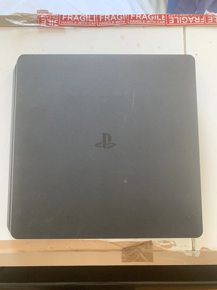 Sony PlayStation 4 Slim 1To Console - Noire - Photo 1/2
