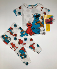 NWT Sesame Street Baby Boy 0r Girl Cookie Monster  Oscar pajamas size 12 Months
