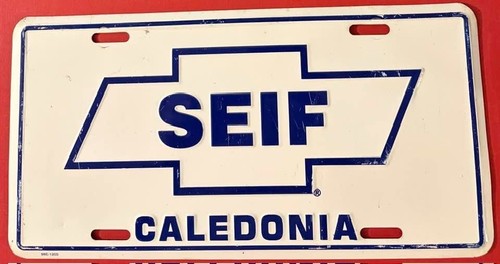 Vintage Seif Chevrolet Dealership Booster License Plate Caledonia Michigan