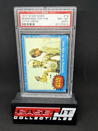 1977 Topps Star Wars #19 Searching for the little droid — PSA 8 (ST)
