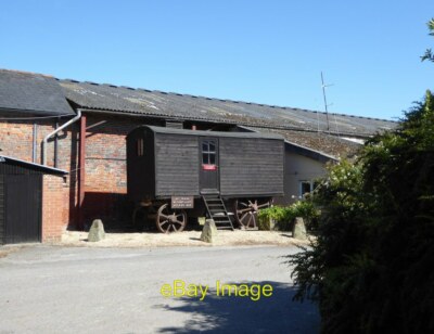 Photo 6x4 Wheeled shepherd's hut in the farmyard Alton Barnes Farm An int c2017