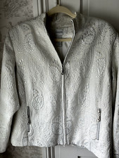 Chico jacket....lovely ivory white w/silver overlay pattern,silk lining,zippers