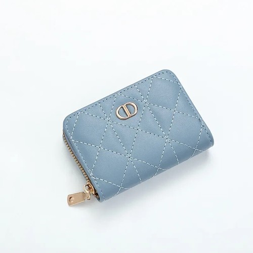 This is a women's zip-around wallet in a light blue color, made of faux leather