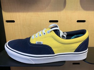 blue yellow and white vans
