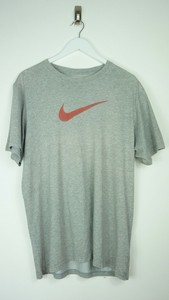 nike small tick t shirt