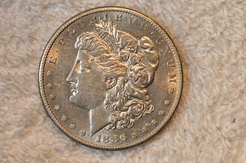 1886-S  AU  MORGAN DOLLAR