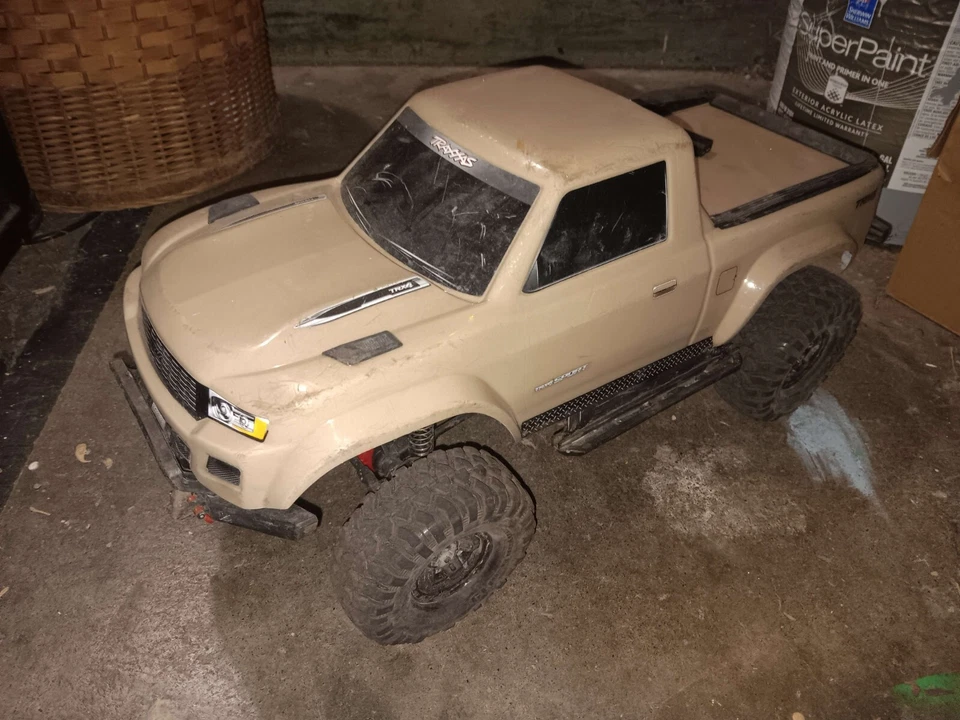 tan traxxas trx 4 used, with 3 batteries, charger, and tamiyama too trax convert - Image 3 of 4
