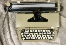Vintage Smith-Corona Deville Deluxe Typewriter with Case  thumbnail