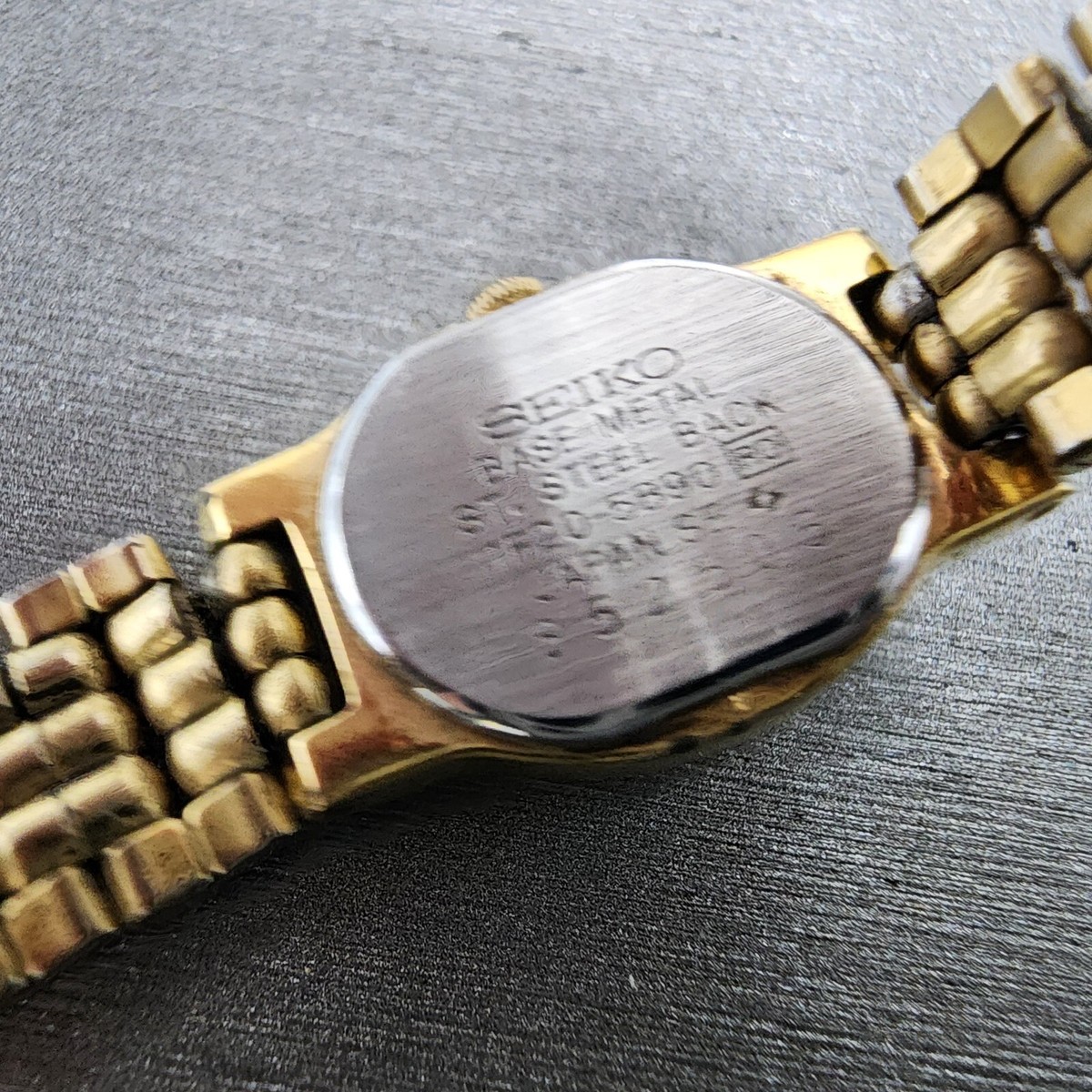 Seiko Watch Women 15mm Gold Dial Gold Tone Oval 1F20-5B90