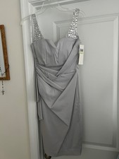 New maggy london silver cocktail dress with embellishments on shoulder size 4