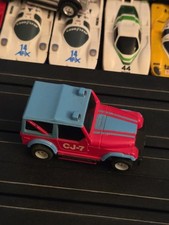 Tyco HO Scale Red  Blue CJ-7 Jeep Slot Car