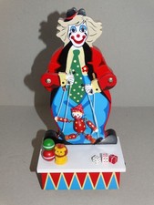 Spieldose Clown mit Marionette aus Holz - Spieluhr Zirkus Holzarbeit H. 29 cm