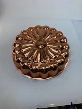 Vintage copper tone aluminum mold round sunburst design kitchen decor