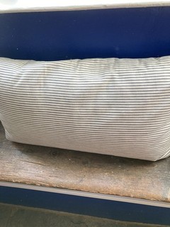 Vintage feather ticking pillow