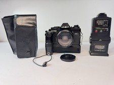 Minolta X-700 35mm SLR Camera w/ 50mm Lens, Motor Drive  Flash - Tested
