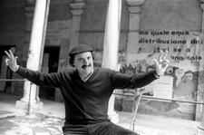 Italian writer poet Giuseppe Conte gesticulating with open arms a - Old Photo