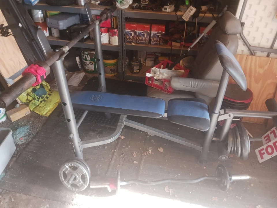 Juego de pesas dorado para gimnasio Foto 3 de 3