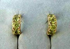 Lab Created 1.57 CT Round Peridot In 14K Yellow Gold Plated Huggie/Hoop Earrings
