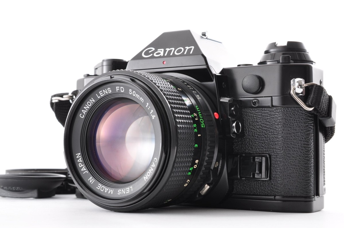 Canon AE-1 FD 50mm 1:14 S.S.C. キャノン Canon AE-1 Program Black / Lens New FD 50mm f/1.4 Excellent