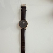 Daniel Wellington Unisex Quarzo Analogico quadrante nero cassa oro pelle marrone