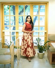 Women's Rust Red Sleeveless Top and Flared Botanical Leaf Printed Maxi Skirt