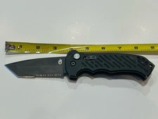 Gerber 06 Assist S30V Drop Point Folding Knife Serrated Steel Blade