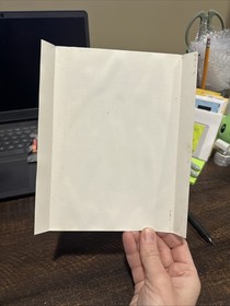 Arte de contraportada de CD Sega solo Jurassic Park da&ntilde;os por agua