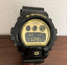 Orologio digitale CASIO G-SHOCK DW-6900CB oro nero testato funzionante