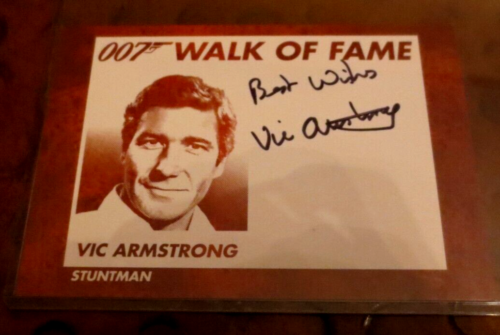 Postal autografiada doble firmada Vic Armstrong James Bond 007 - Imagen 1 de 2